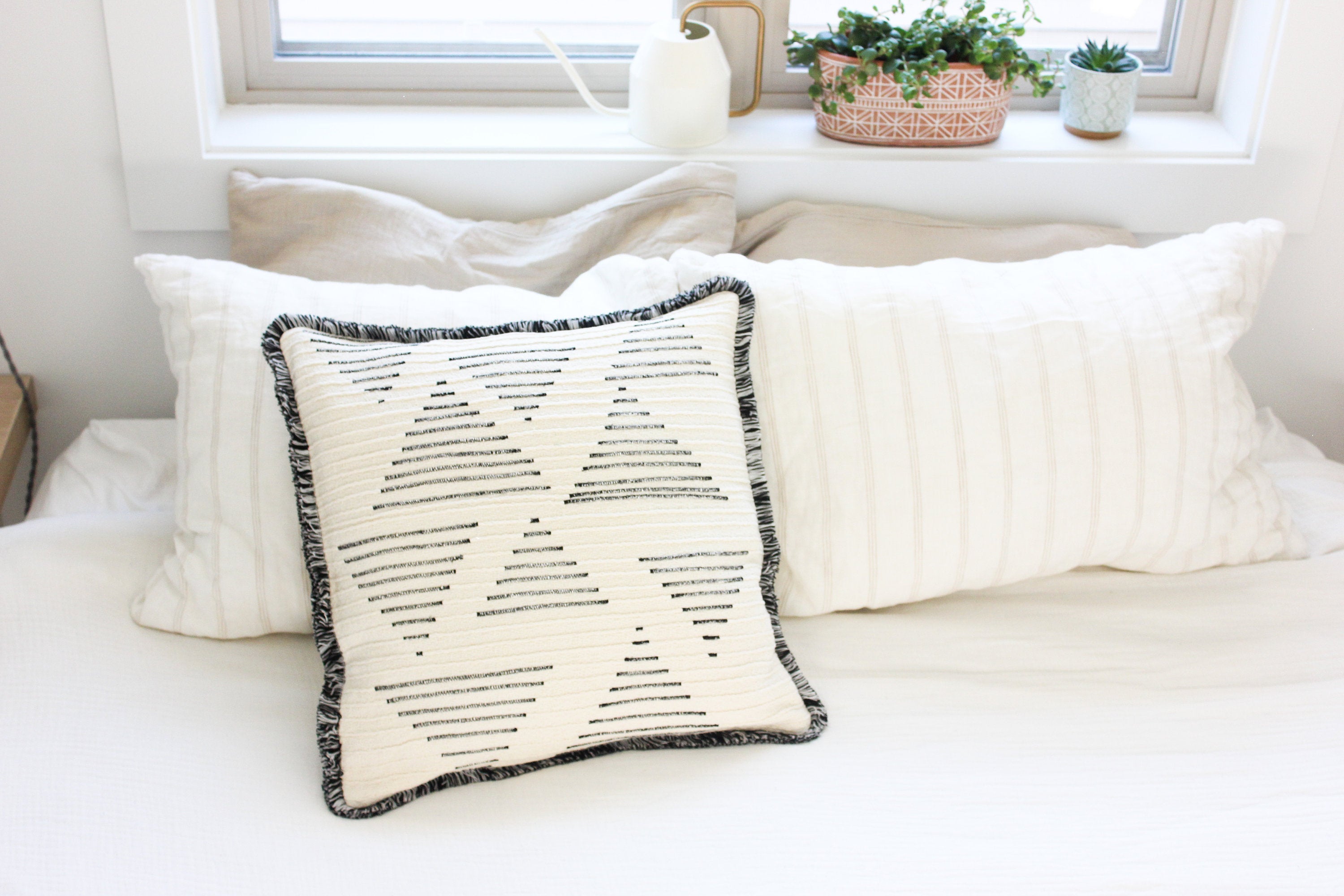 Textured Triangle Lines Square Throw Pillow Cushion in Beige and Black with Insert